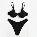 Black bikini set on a white background