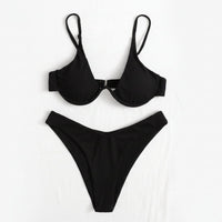 Black bikini set on a white background