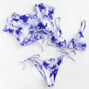Blue and white tie-dye bikini set on a white background