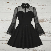 Black dress with sheer sleeves on a white background
