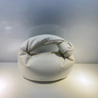 White bean bag chair on a light gray background
