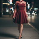 Red dress with sheer sleeves on a white background