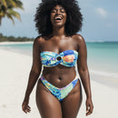Colorful bikini set on a curvy woman standing on white sand beach